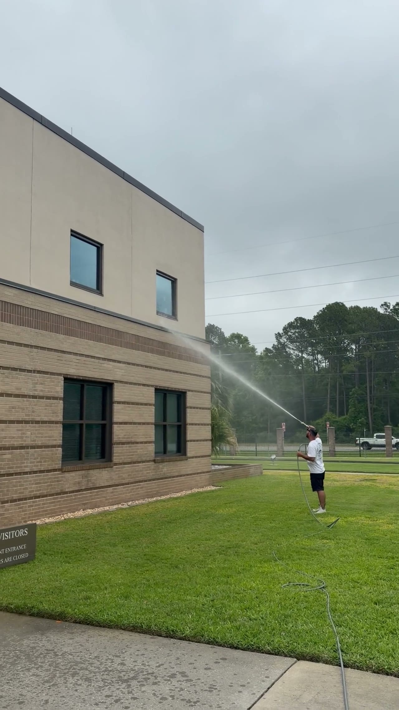 Commercial building pressure washing by The Stream Team